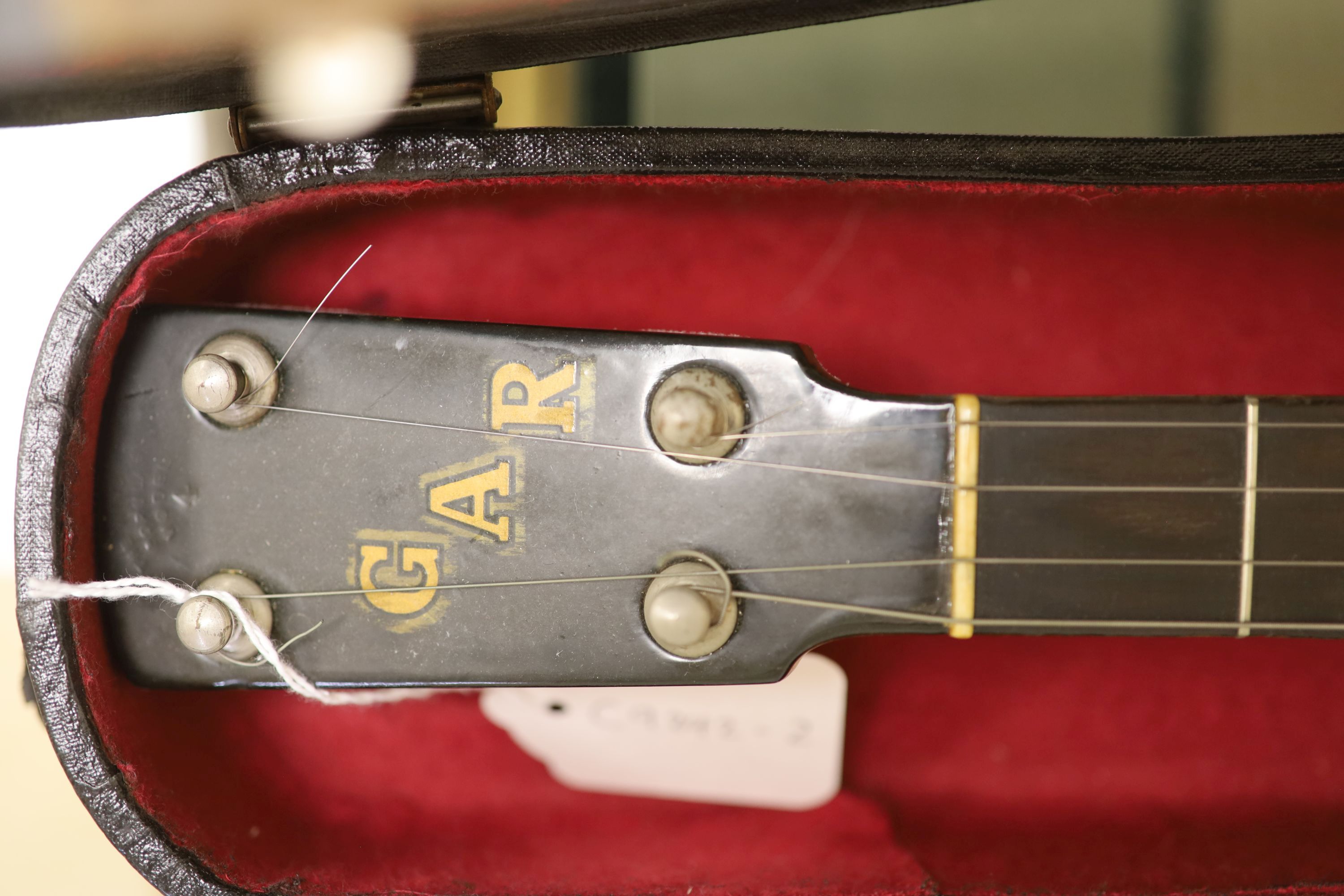 A Windsor popular 4 string banjo, cased